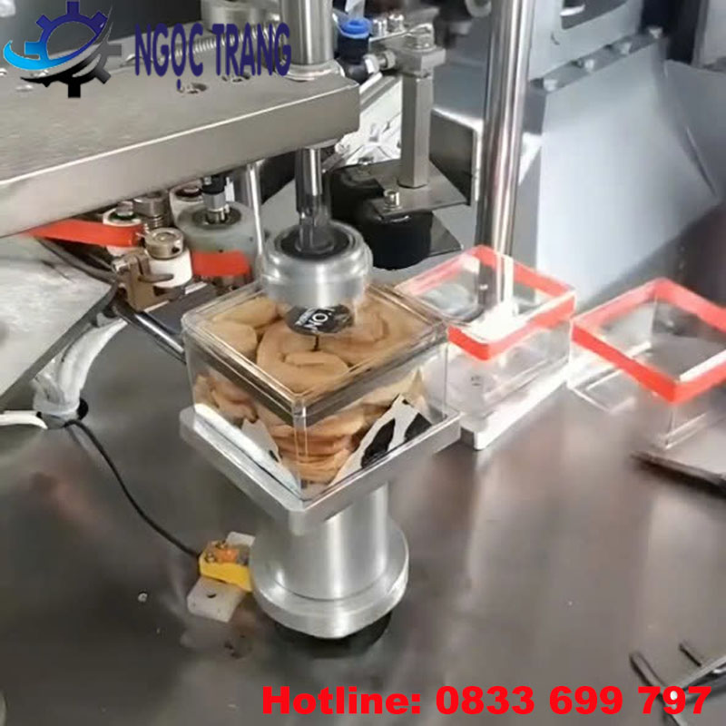 Máy quấn băng keo hộp bánh