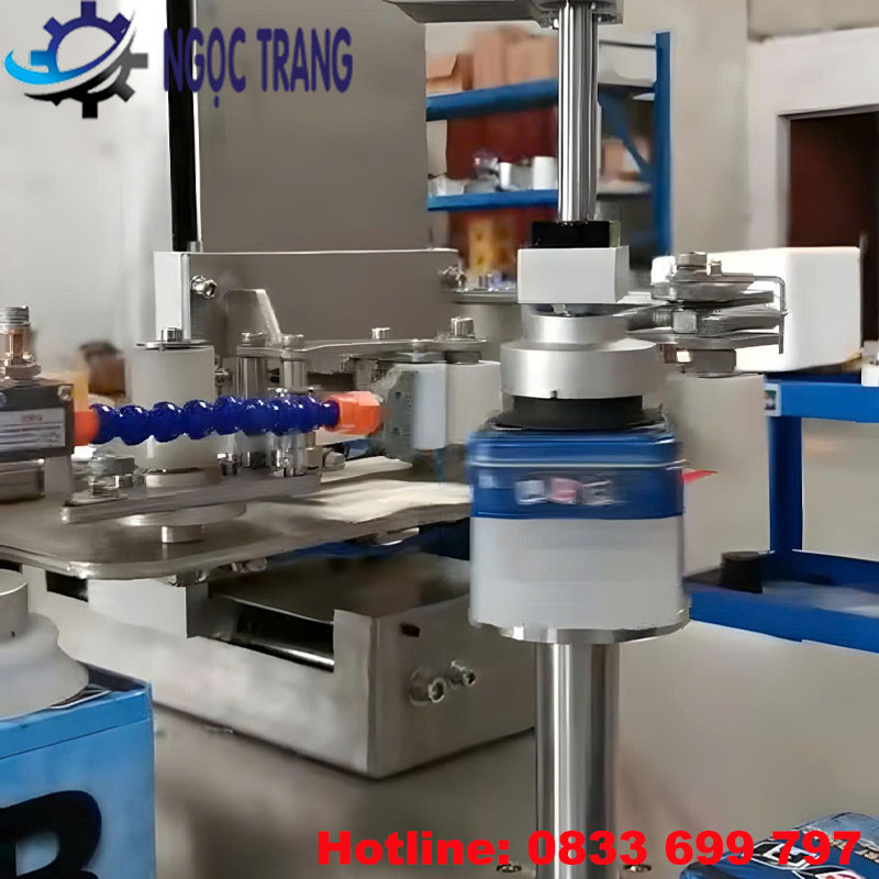 Máy dán băng keo hộp thiếc
