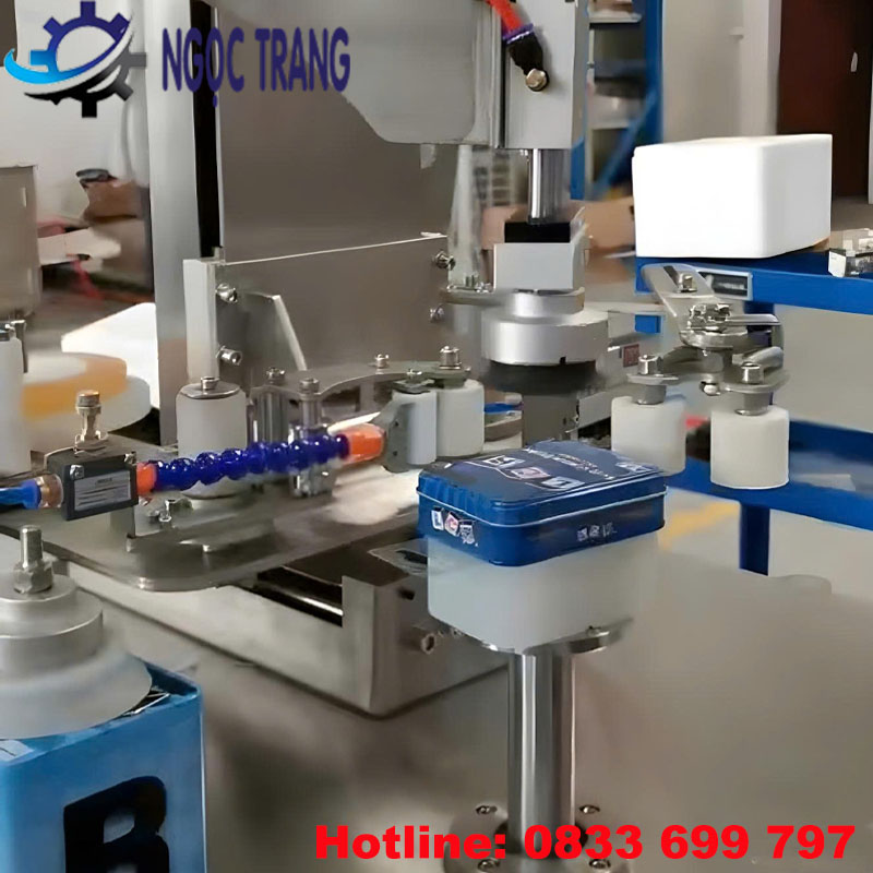 Máy dán băng dính hộp thiếc