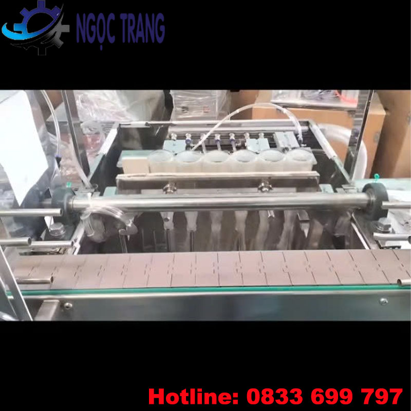 Máy súc rửa chai lọ tự động