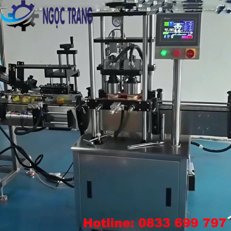 Máy vặn nắp chai hút chân không