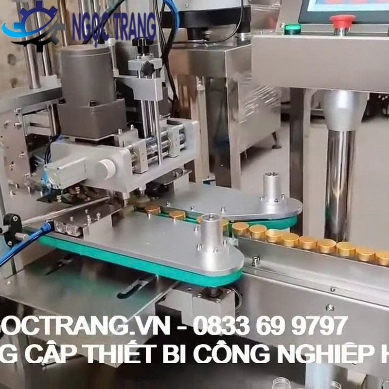 Máy siết nắp chai