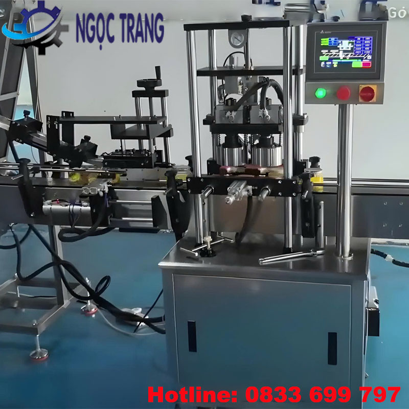 Máy đóng nắp chai hút chân không