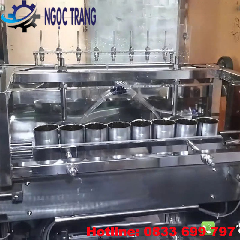 Máy rửa chai tự động