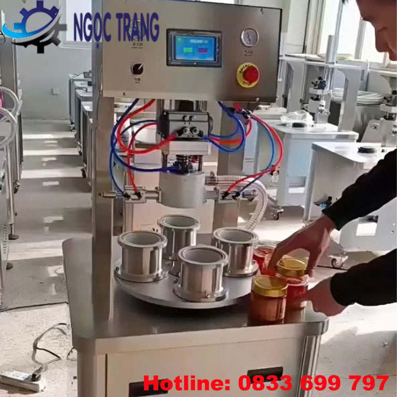 máy đóng nắp chai hút chân không