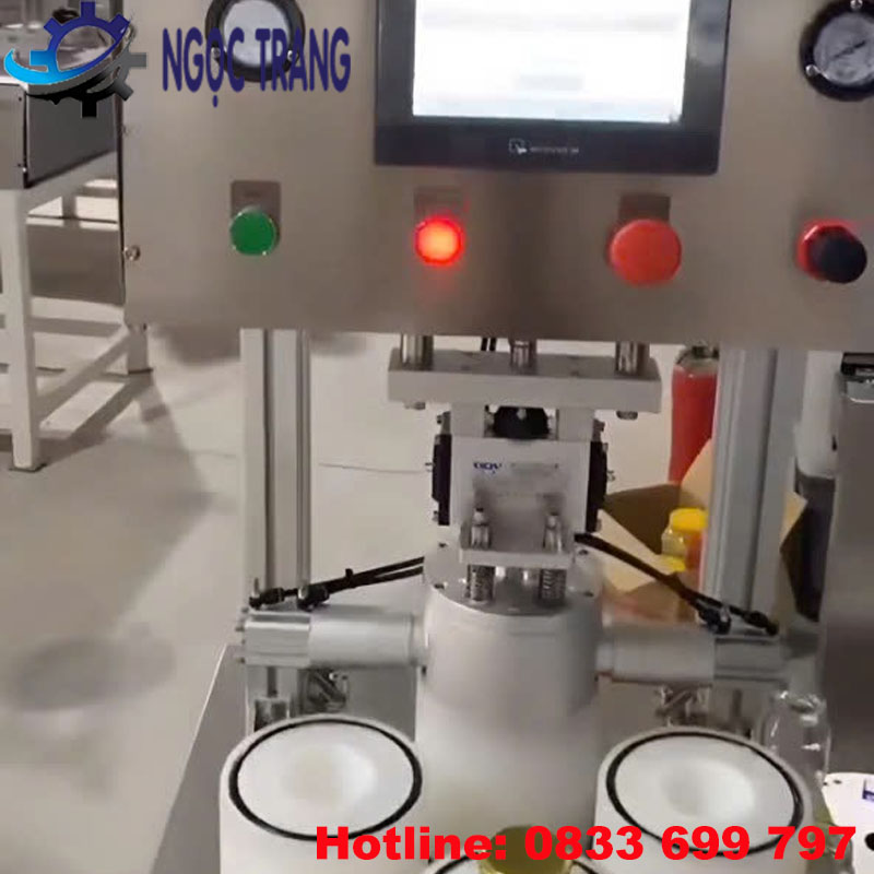 Máy đóng nắp chai hút chân không 