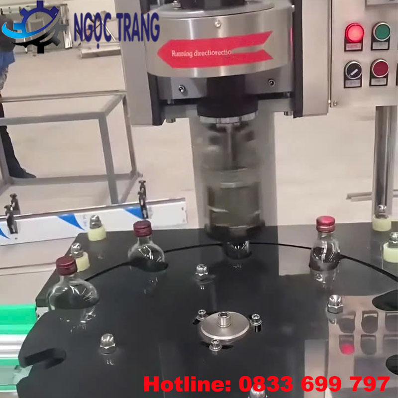 Máy viền nắp nhôm chai thủy tinh